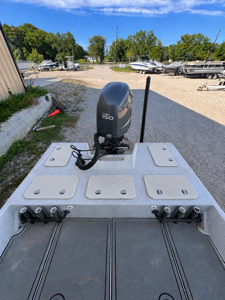 Sunny Marina Boat Deck with Yamaha Outboard.webp